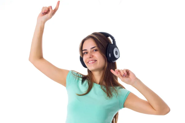 Mujer joven en auriculares — Foto de Stock