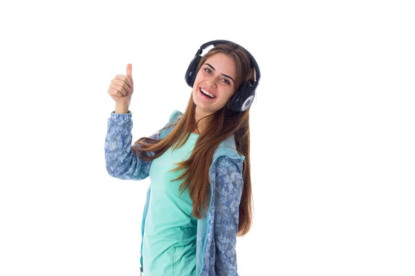 Mujer joven en auriculares — Foto de Stock