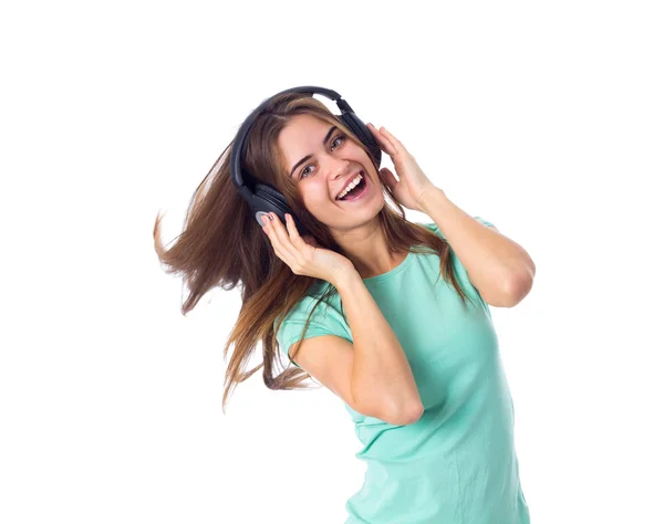 Jovem mulher em fones de ouvido — Fotografia de Stock