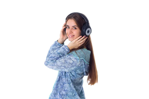 Młoda kobieta w słuchawkach — Zdjęcie stockowe