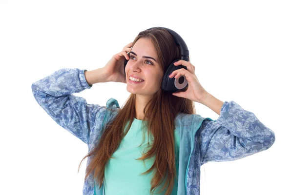 Mujer joven en auriculares — Foto de Stock