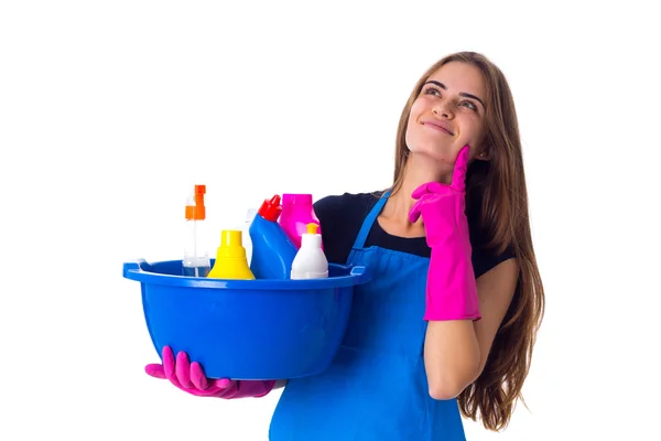 Mujer sosteniendo cosas de limpieza en el lavabo —  Fotos de Stock