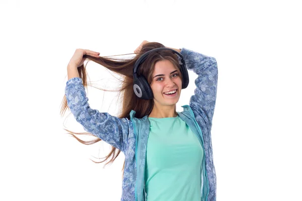 Mujer joven en auriculares —  Fotos de Stock