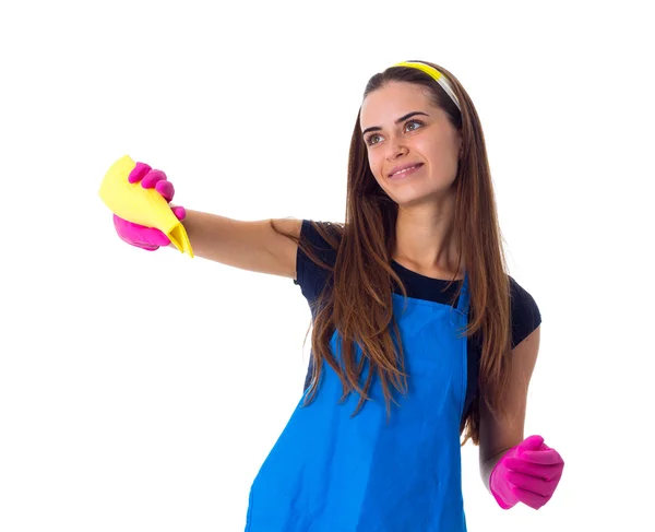 Kadın bir toz bezi kullanarak önlük — Stok fotoğraf