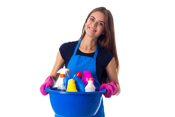 Woman holding cleaning things in washbowl — Stock Photo, Image