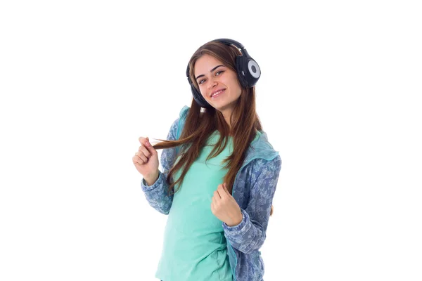 Mujer joven en auriculares — Foto de Stock