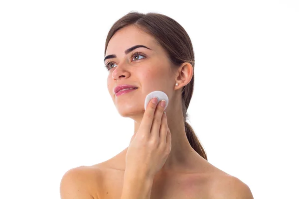 Young woman using cotton pads — Stock Photo, Image