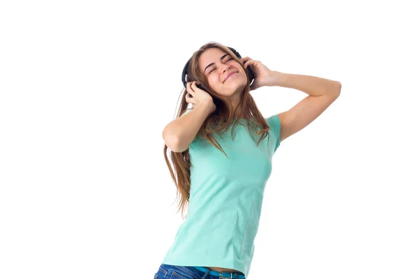 Młoda kobieta w słuchawkach — Zdjęcie stockowe