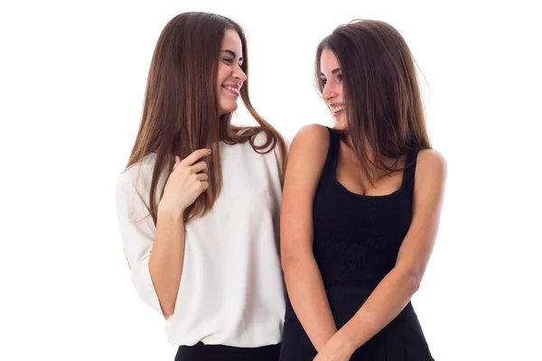 Two young woman talking two each other Royalty Free Stock Photos