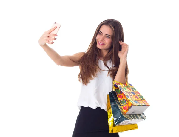 Woman with shopping bags making selfie — Stock Photo, Image