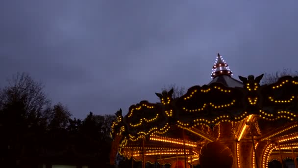 Illuminated retro carousel at night — Stock Video