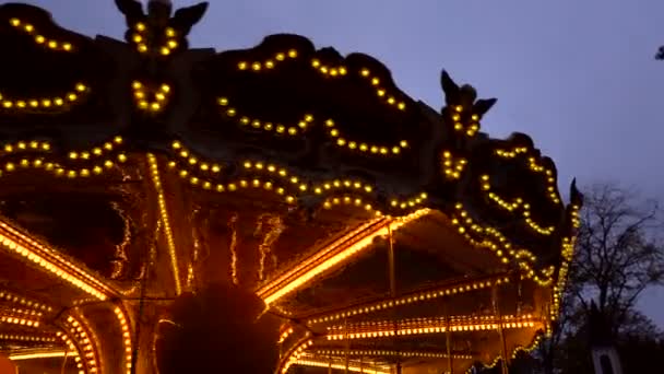 Illuminated retro carousel at night — Stock Video