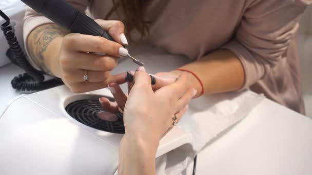 Manicure artist making professional manicure — Stock Video