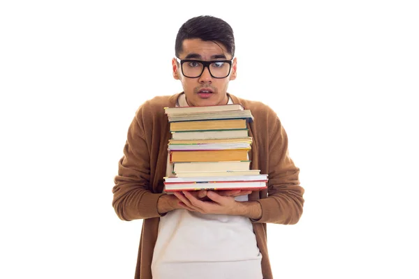 Jonge man in glazen met boeken — Stockfoto