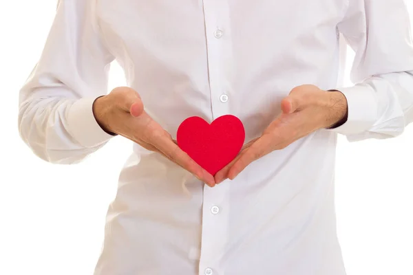 Young man holding a read heart — Stock Photo, Image