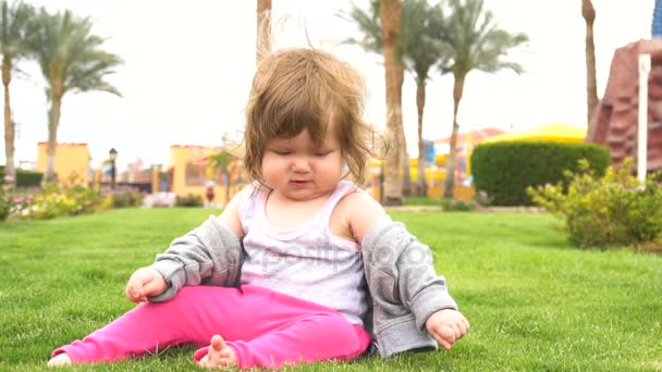 Happy cute baby in park — Stock Video