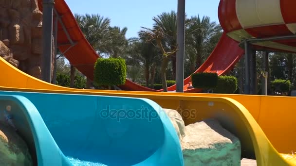 Woman sliding on water slide — Stock Video