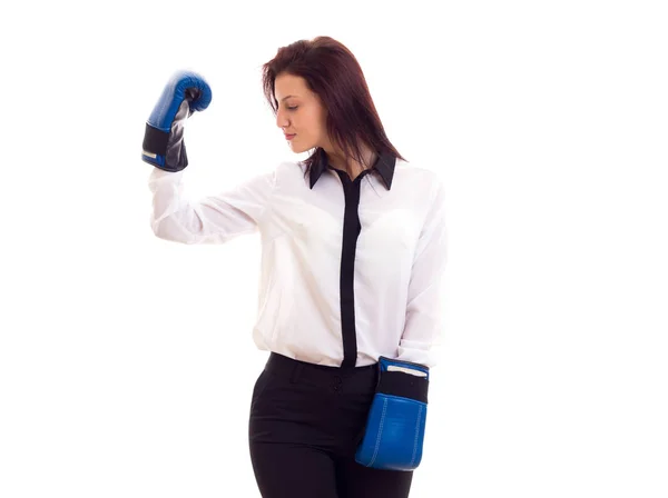 Young businesswoman in boxing gloves — Stock Photo, Image