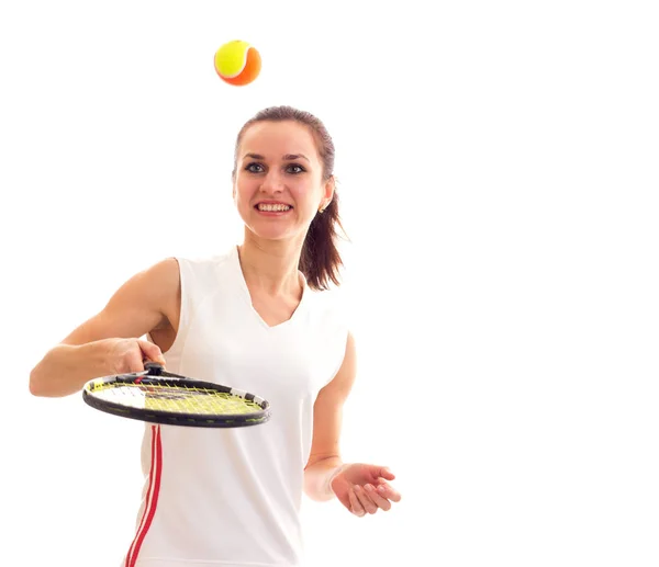 Frau spielt mit Tennisschläger — Stockfoto