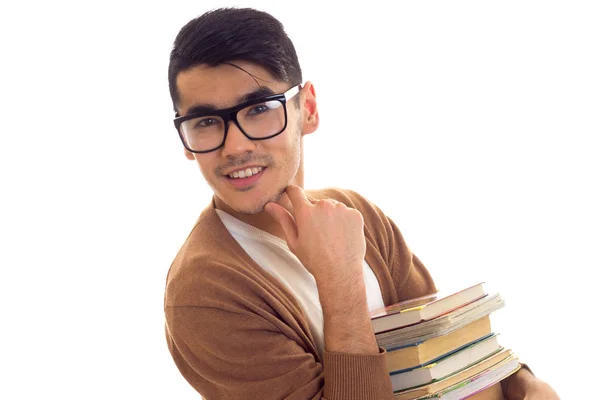 Jonge man in glazen met boeken — Stockfoto