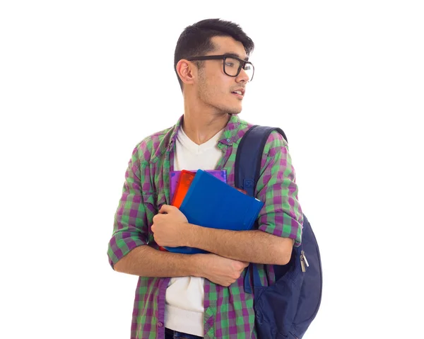 Jeune homme avec sac à dos et livres — Photo