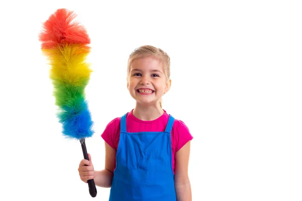 Meisje in schort met stofdoek — Stockfoto