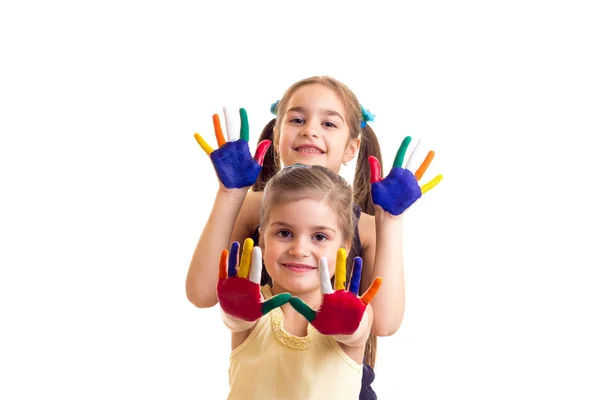 Meninas com as mãos coloridas — Fotografia de Stock