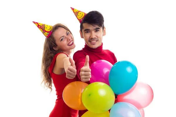 Jovem casal com balões — Fotografia de Stock