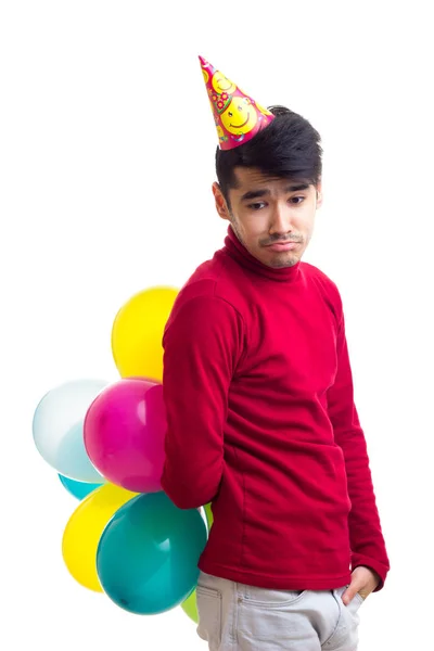 Junger Mann mit Luftballons — Stockfoto