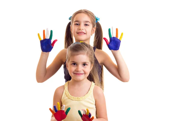 Meninas com as mãos coloridas — Fotografia de Stock