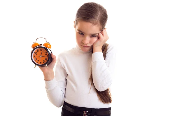 Holčička drží hodiny — Stock fotografie