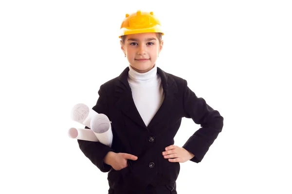 Klein meisje in gele beschermende helm — Stockfoto