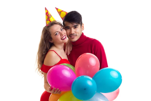 Junges Paar mit Luftballons — Stockfoto