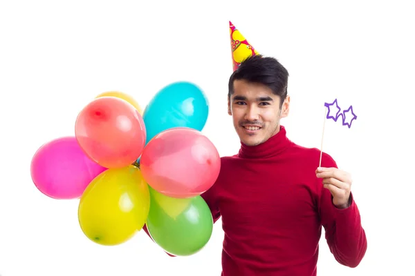 Junger Mann mit Luftballons — Stockfoto