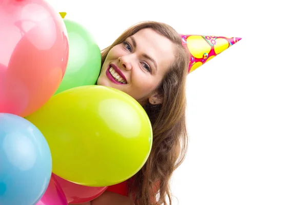 Ung kvinna innehav ballonger — Stockfoto