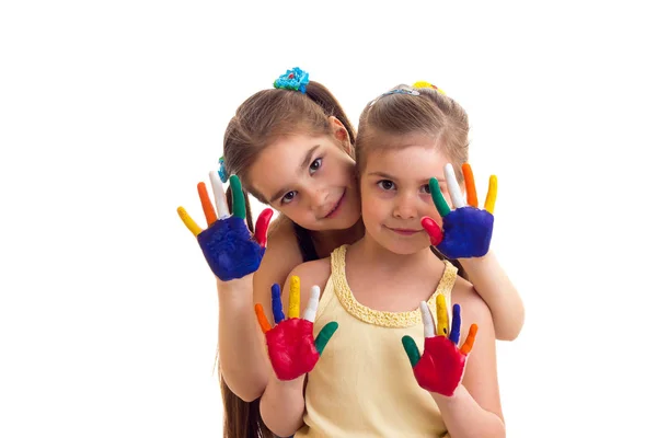 Meninas com as mãos coloridas — Fotografia de Stock