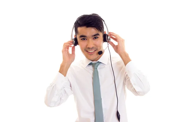 Jonge man met een hoofdtelefoon — Stockfoto