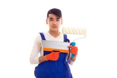 Spatula ve rulo elinde eldiven ile genel Mavili adam