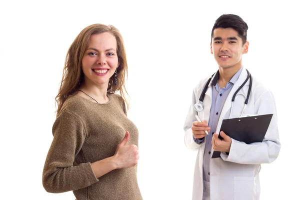 Mannelijke arts en jonge vrouw — Stockfoto