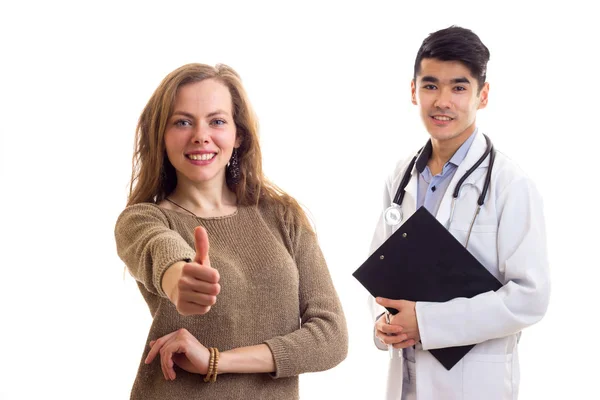 Mannelijke arts en jonge vrouw — Stockfoto