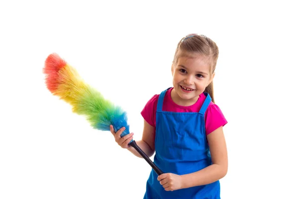 Meisje in schort met stofdoek — Stockfoto