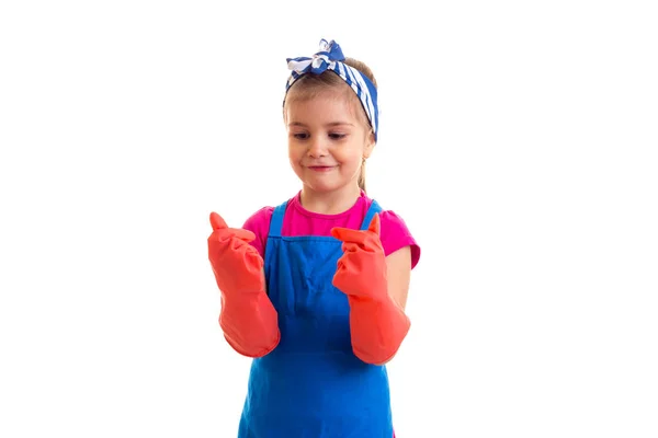 Girl in apron and gloves — Stock Photo, Image