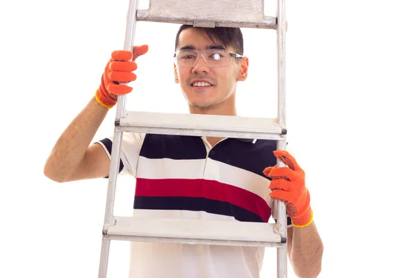 Junger Mann mit Handschuhen und Brille — Stockfoto