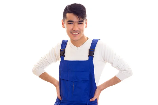 Jonge man in blauw algemene — Stockfoto