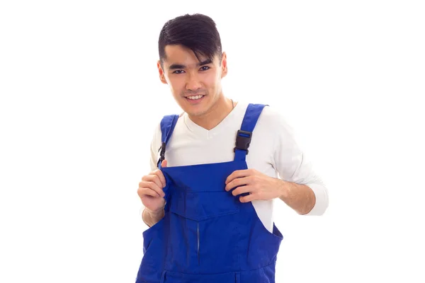 Jonge man in blauw algemene — Stockfoto