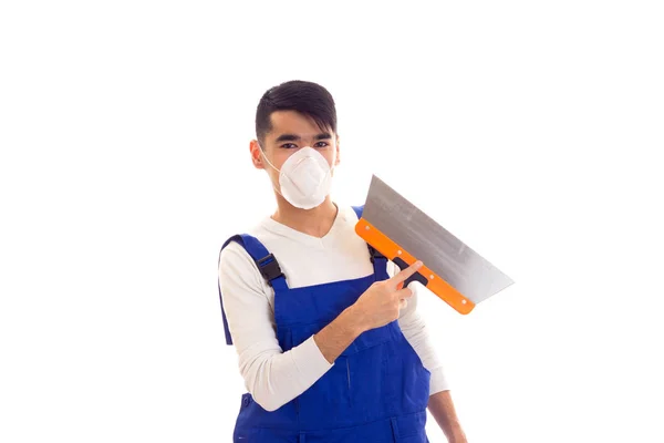 Uomo in blu generale con spatola respiratore — Foto Stock