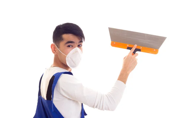 Man in het algemeen met gasmasker holding spatel blauw — Stockfoto