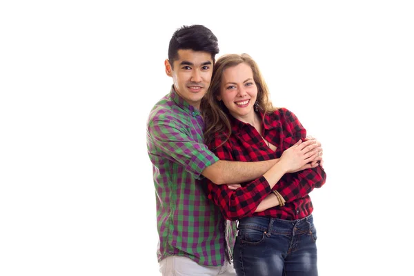 Jovem casal em camisas xadrez — Fotografia de Stock