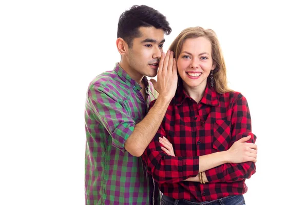 Jovem casal em camisas xadrez — Fotografia de Stock