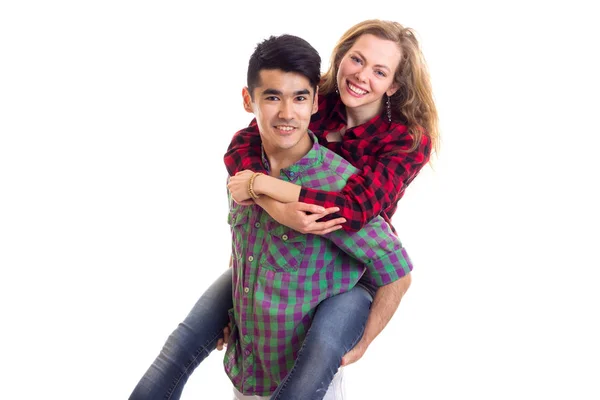 Young couple in plaid shirts — Stock Photo, Image